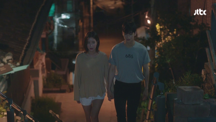 Kang Mi Rae and Do Kyung Seok walking home holding hands.